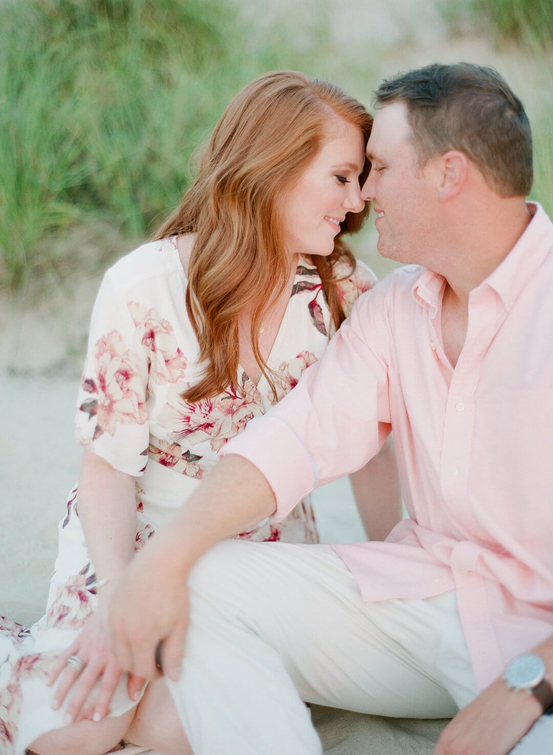 couple at engagement session on the beach together
