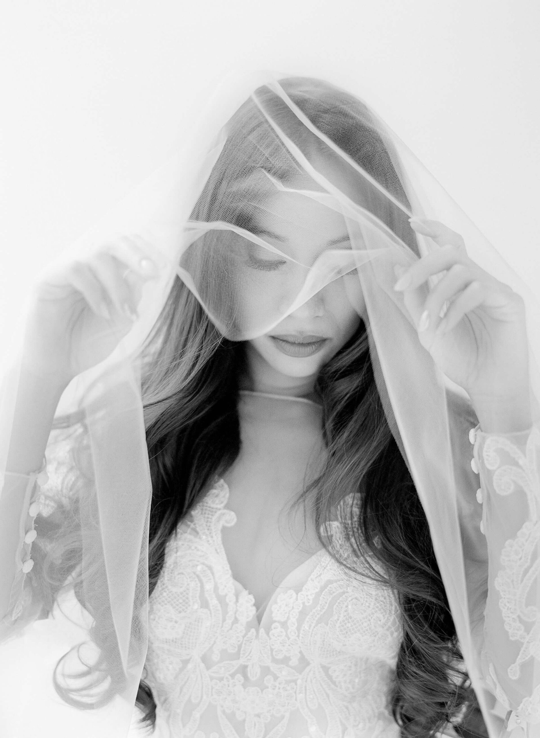 philipeno bride in wedding gown under a sheer veil