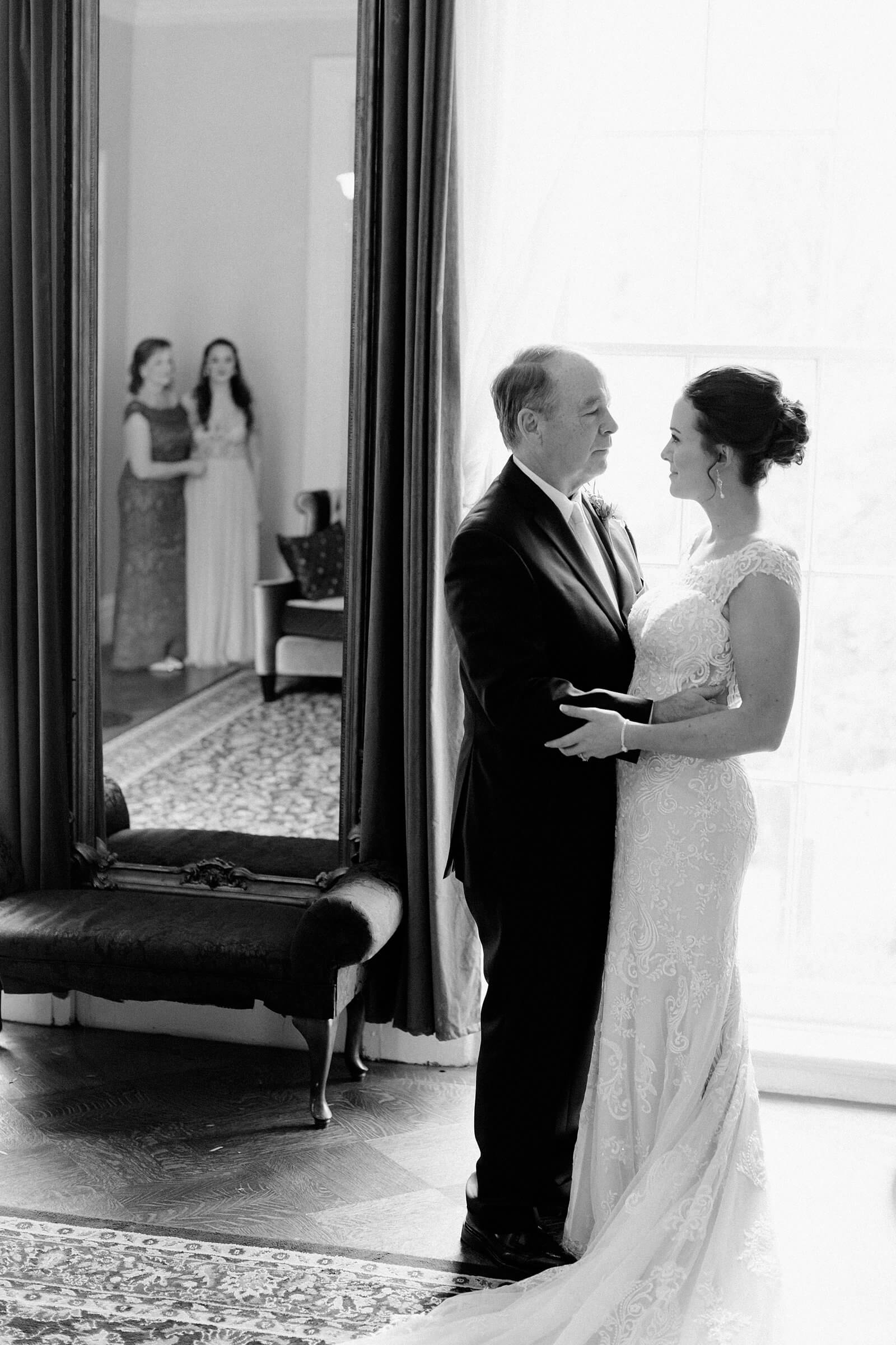 Bride seeing her father before a wedding at The Commonwealth Club
