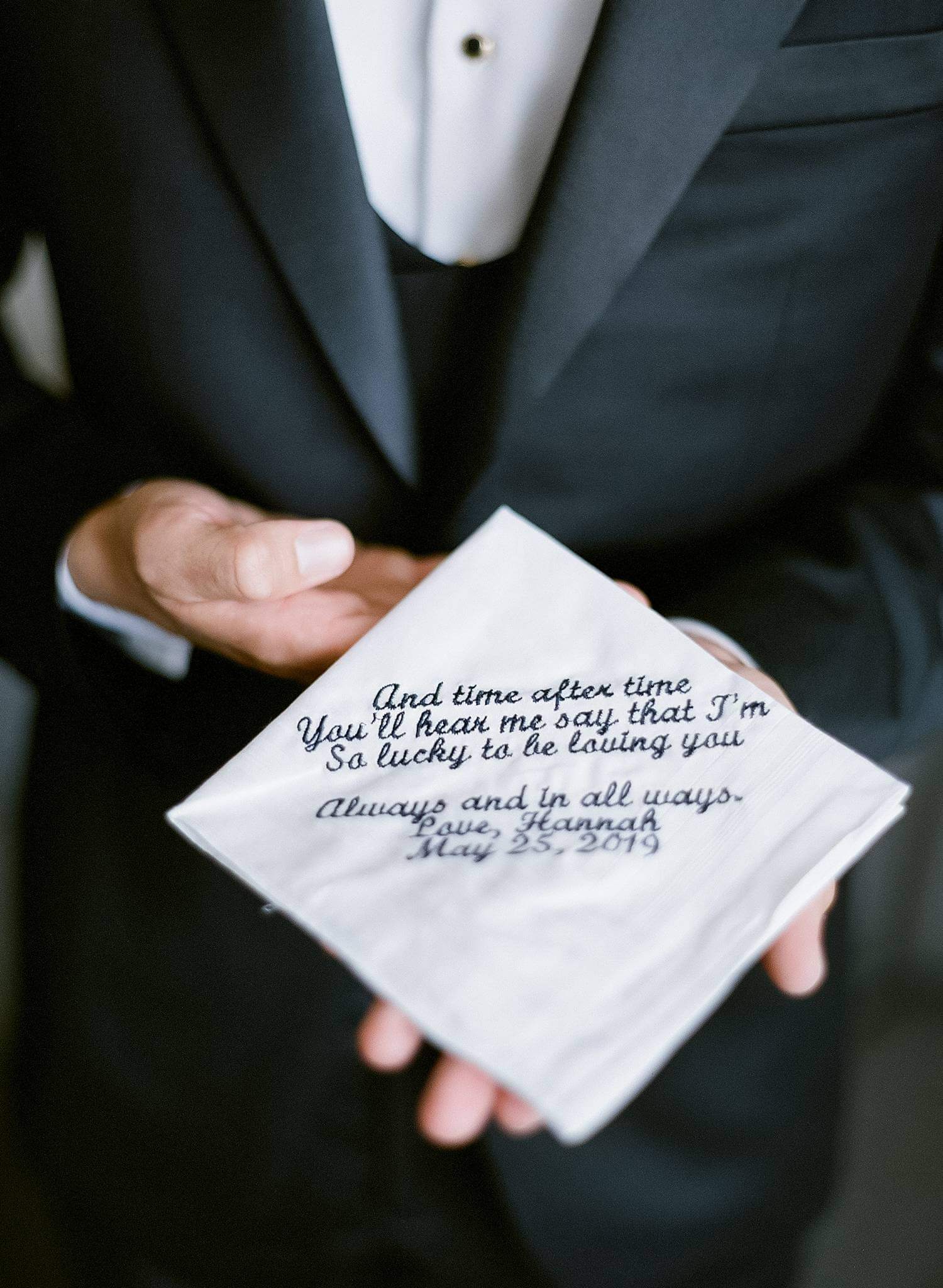 Groom opening gift from bride to be