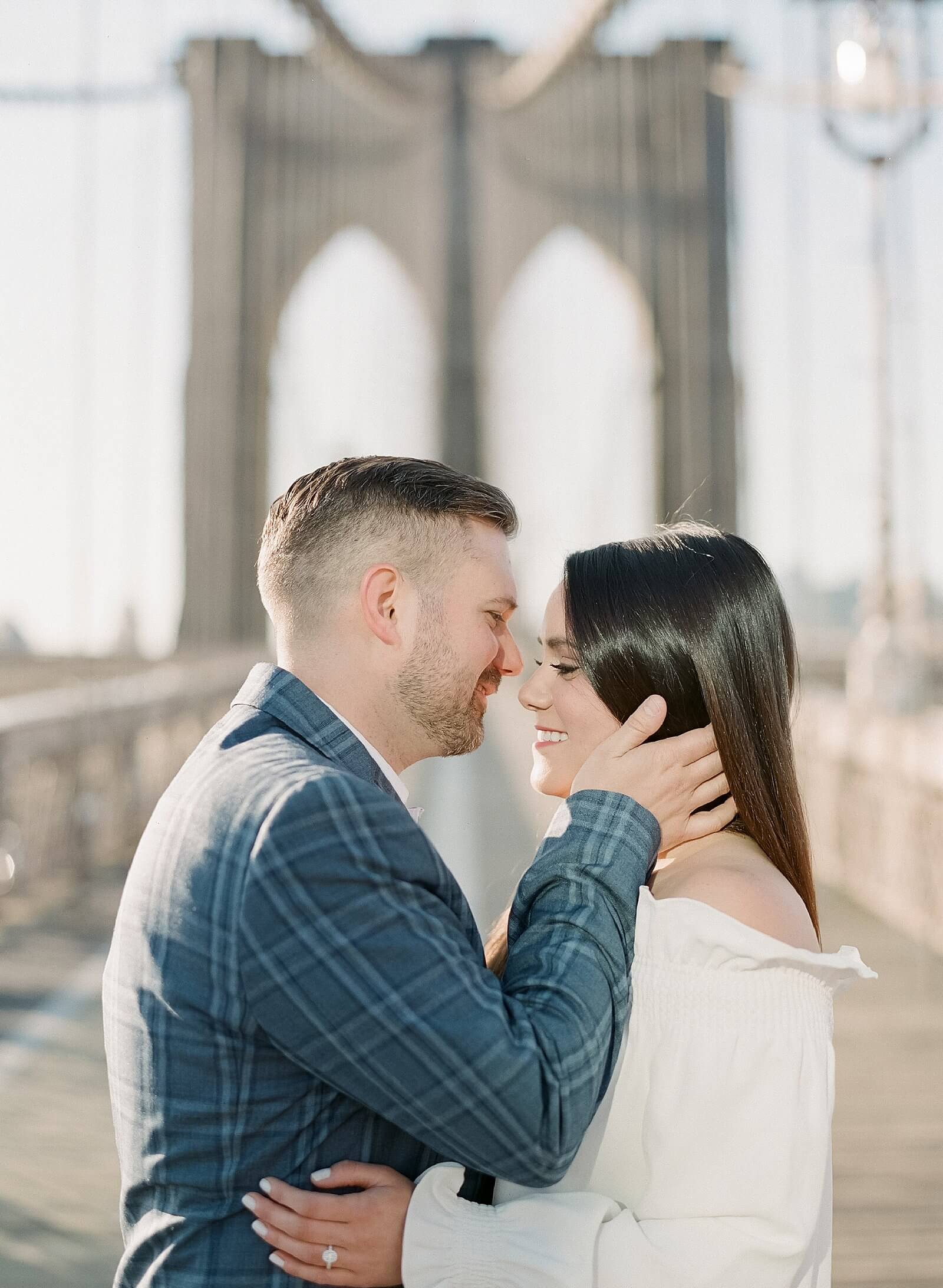 Couple about to kiss during their engagement session in Manhattan.