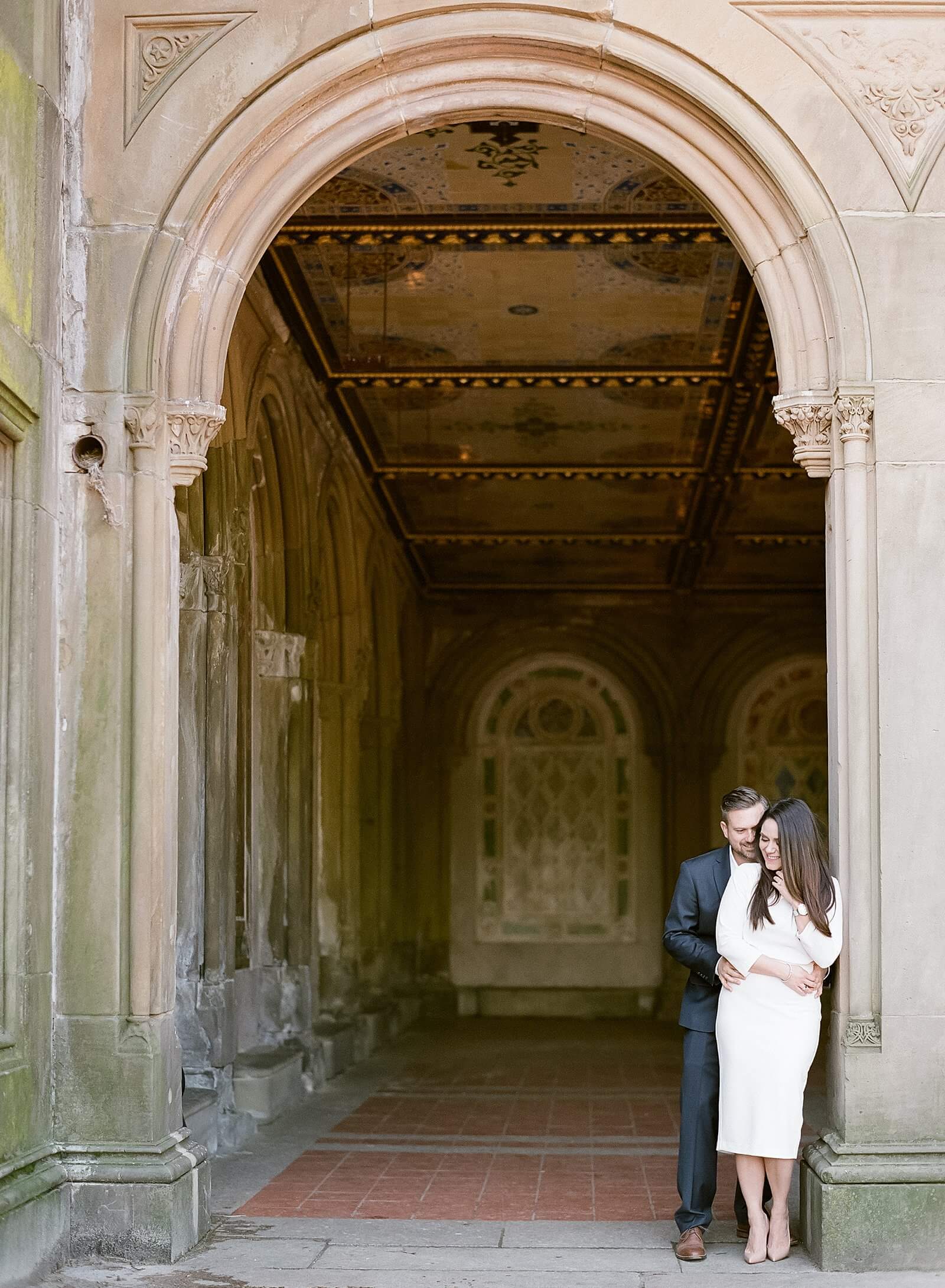 A couple during their engagement session at Bethesda Terrace in Central Park in Manhattan.