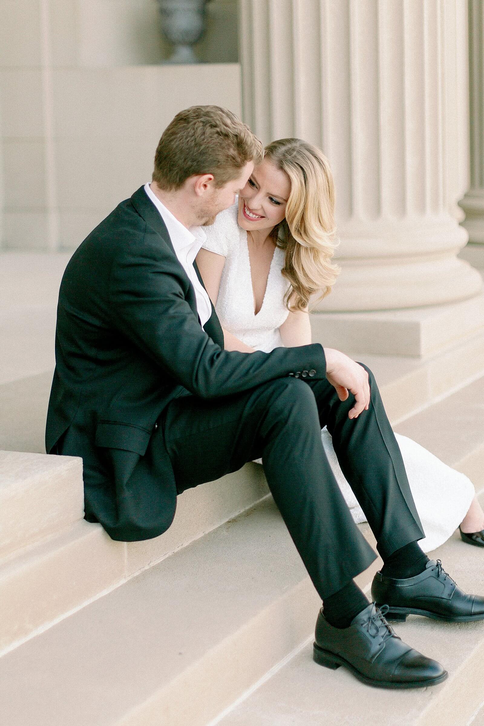 Couple embracing and laughing during their engagement session