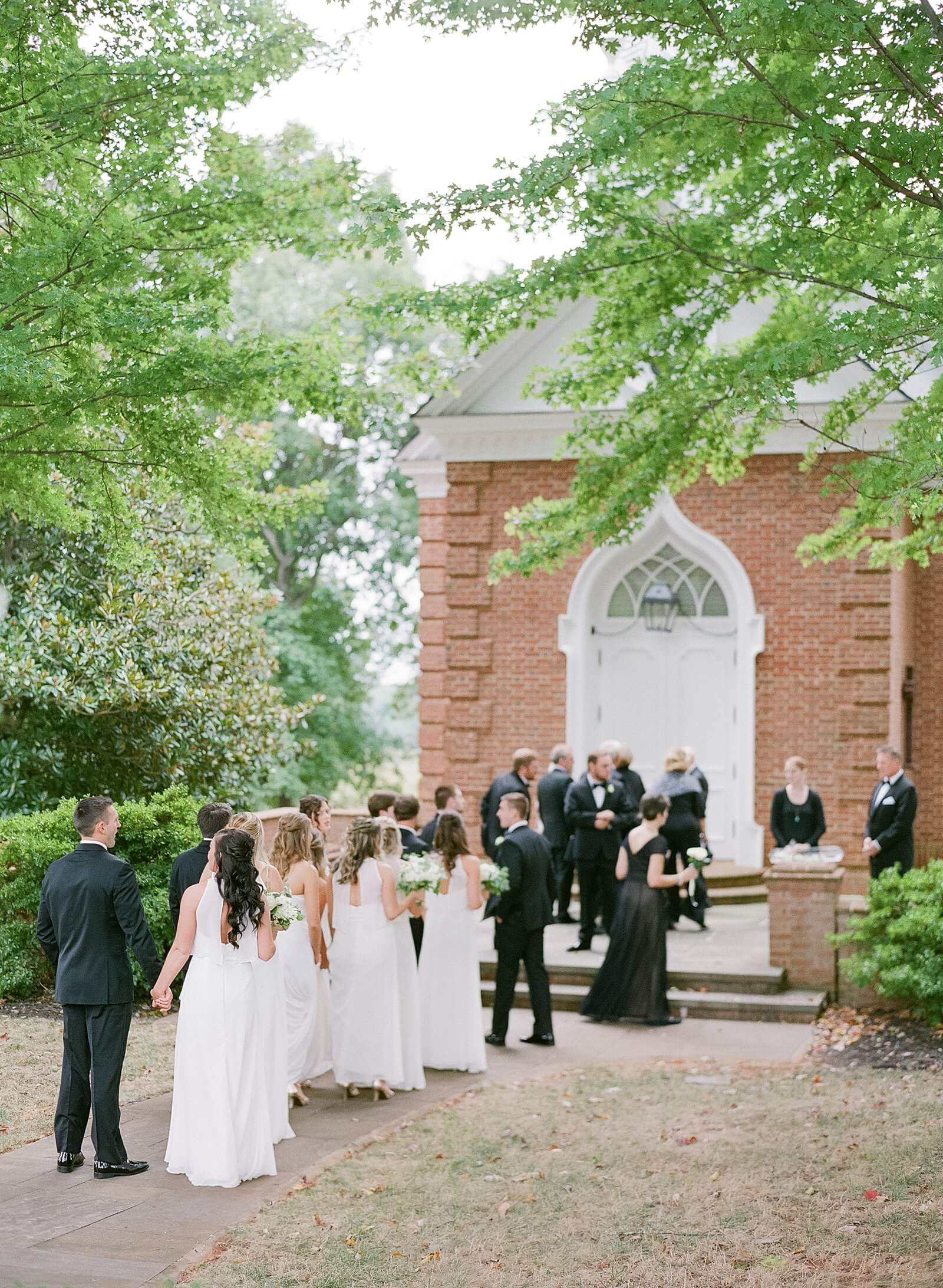 Bridal party heading into the little chapel for a family ceremony at Trump Winery
