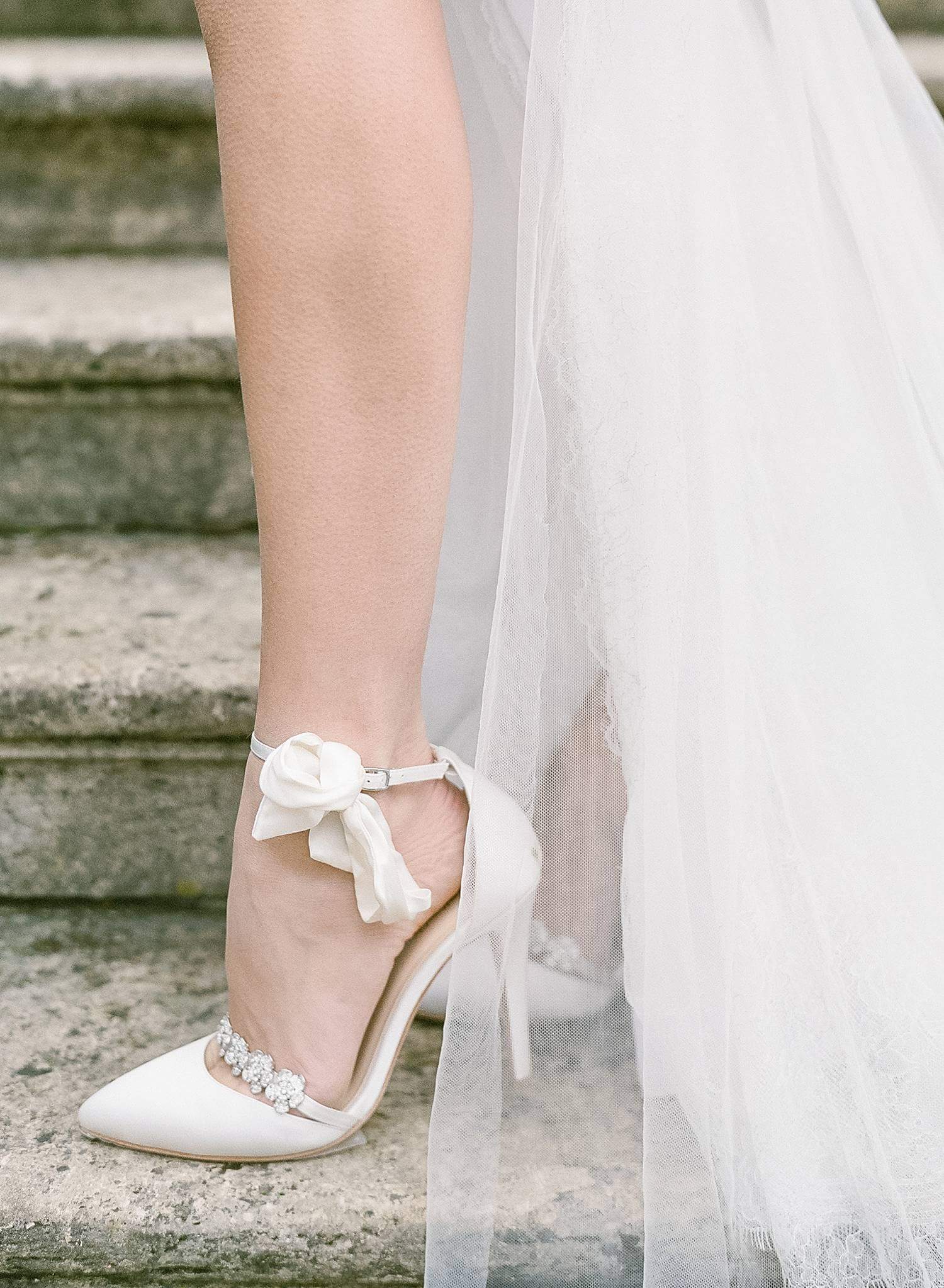Detail photo of bride's shoes while at alter for her elopement in Bordeaux France.
