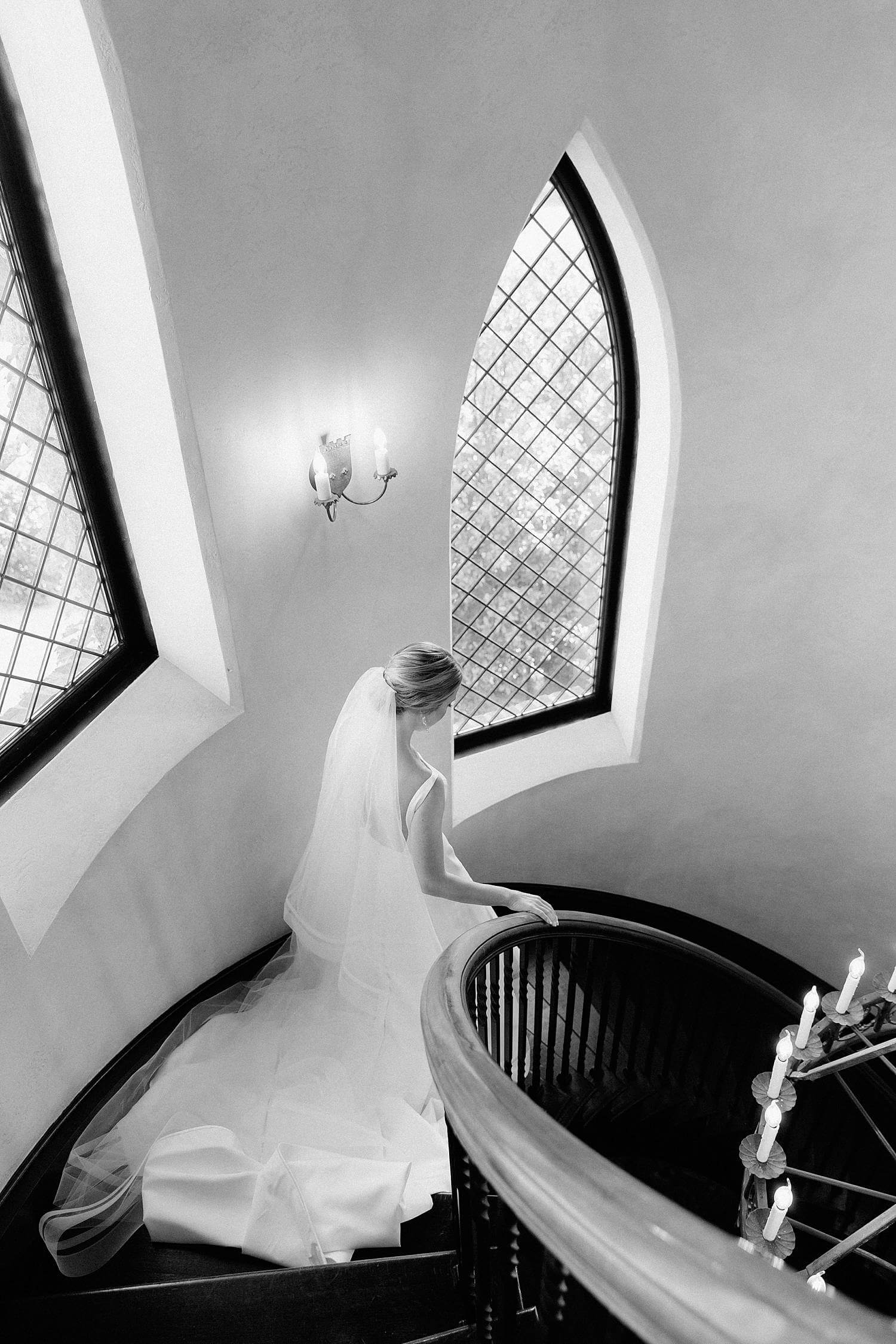 Bride depending spiral staircase at Dover Hall Estate