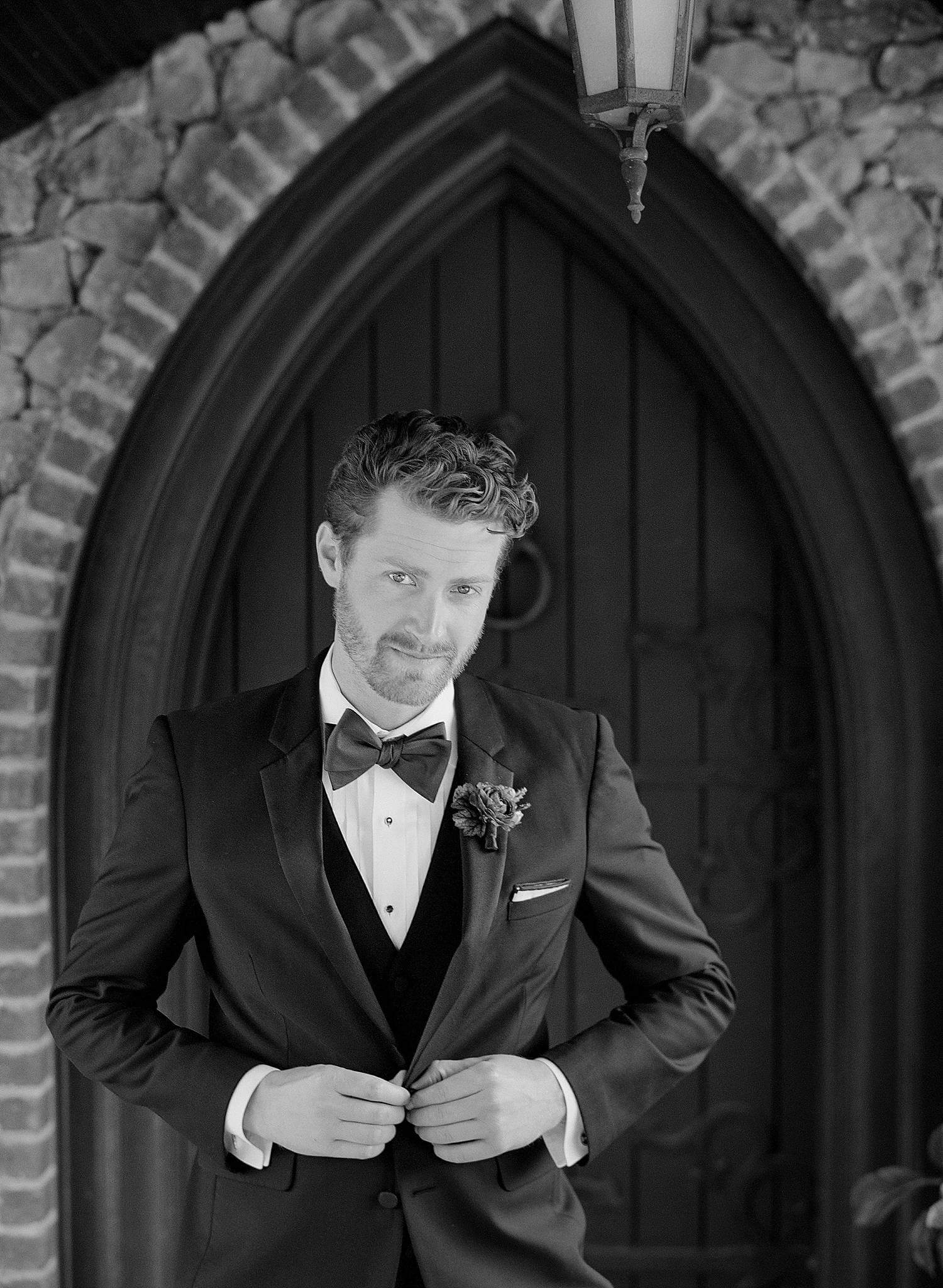 Portrait of groom before his first look.