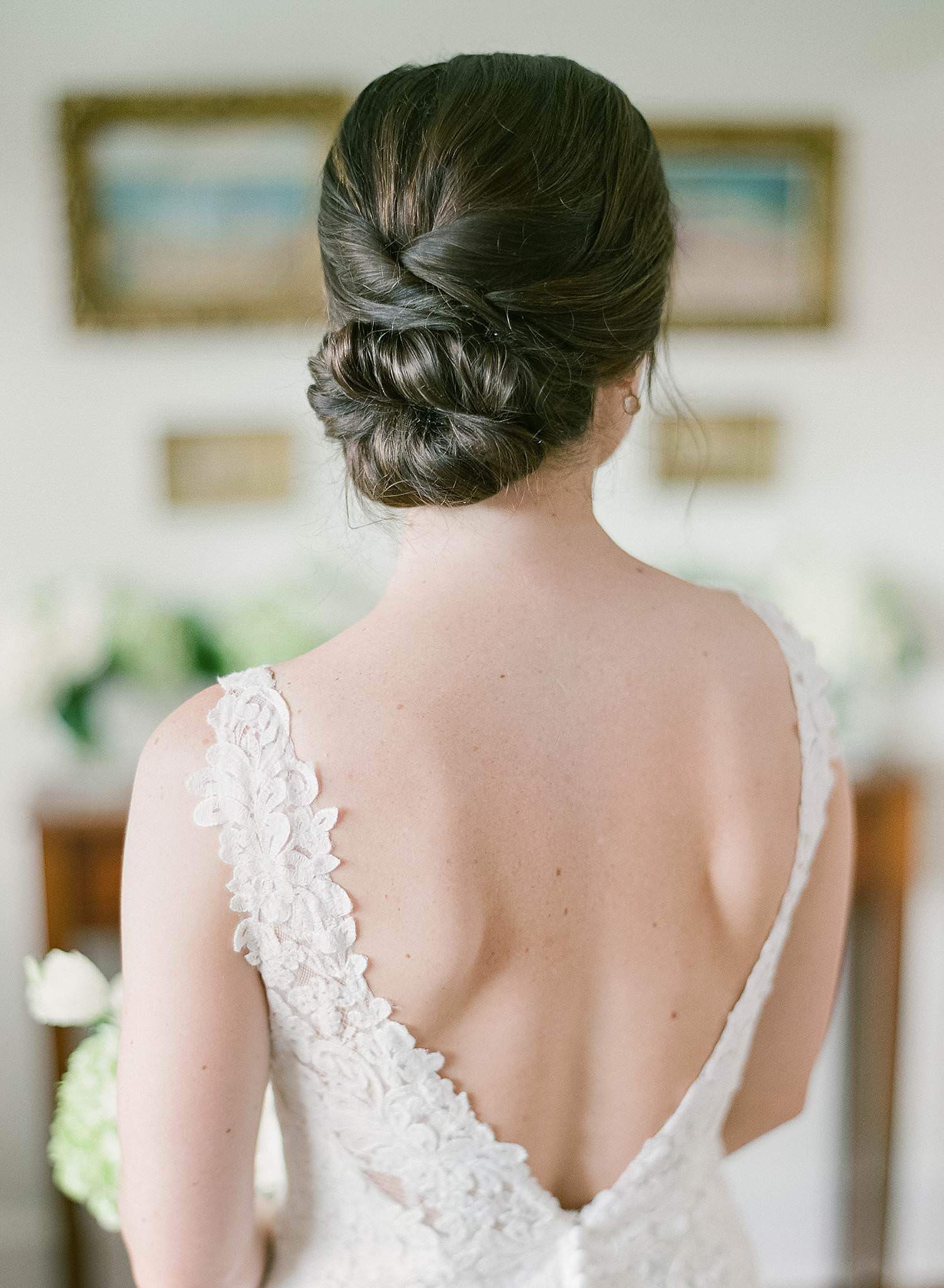 Image of bridal hair up do with bride in dress