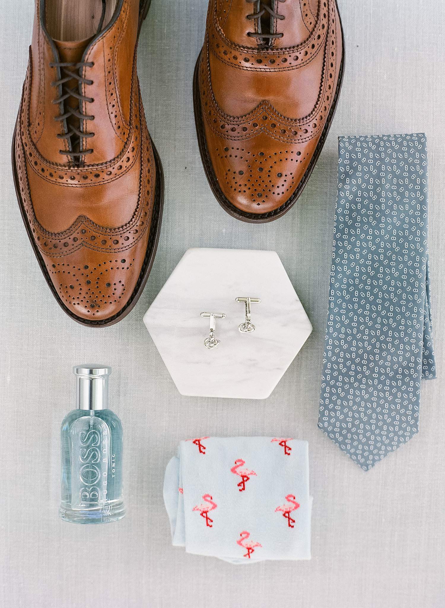 Groom's details. Cufflinks, Hermes tie, Hugo boss cologne, party socks