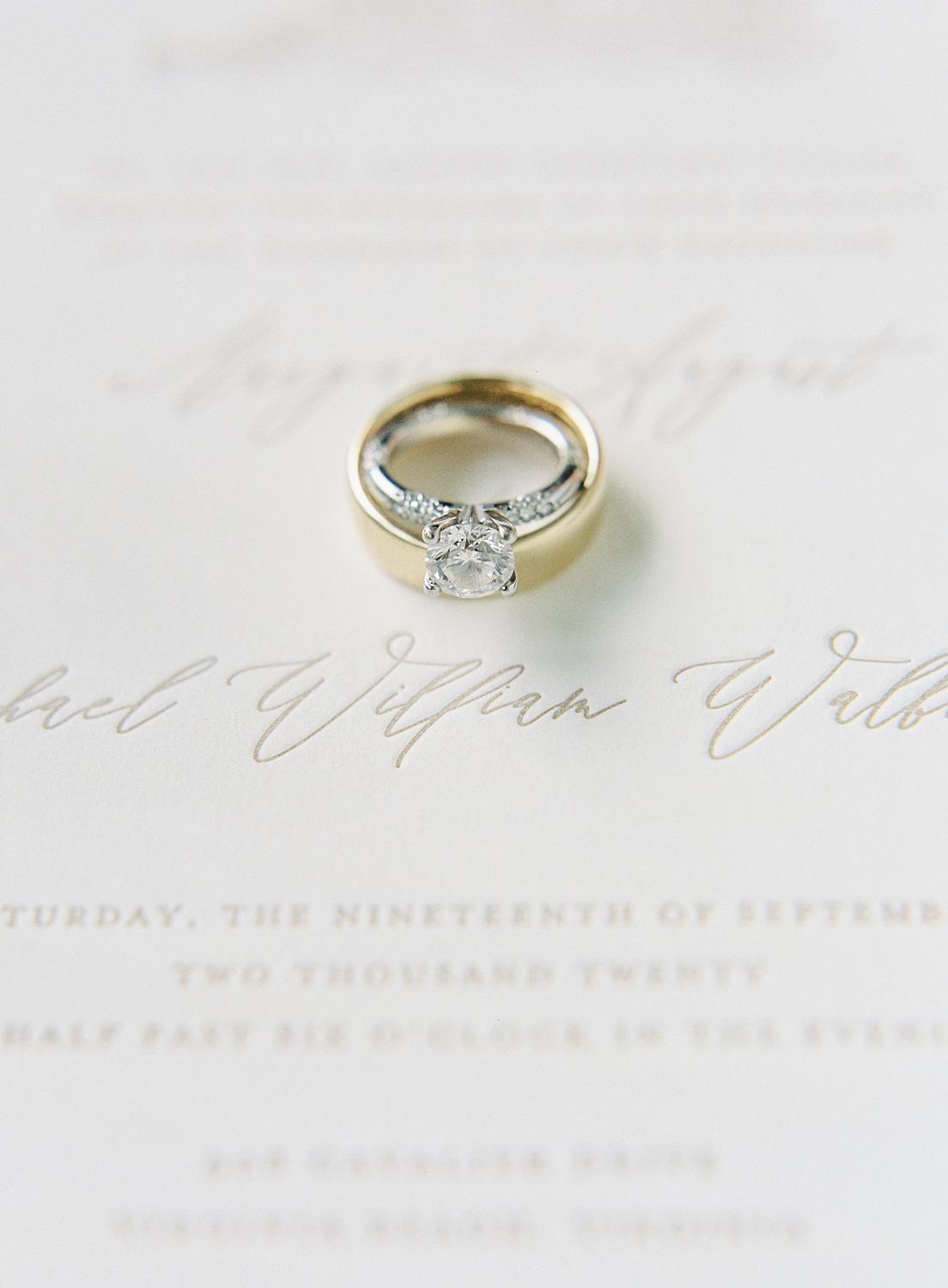 detail images of invitation suite and ring for bride's intimate home wedding