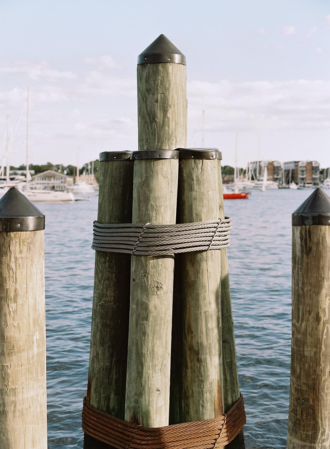 Wood pylons on the dock of The Annapolis Harbor.