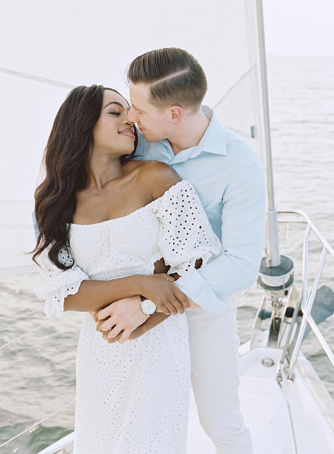Bride and groom kissing during their Annapolis engagement session.