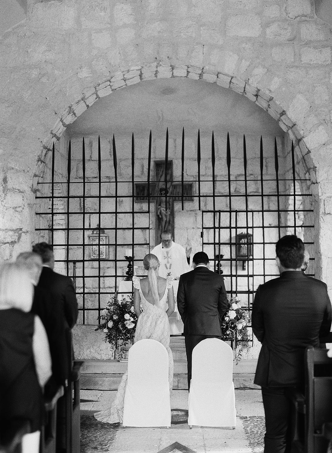 Bride and groom standing together during private family ceremony at Altos De Chavon.