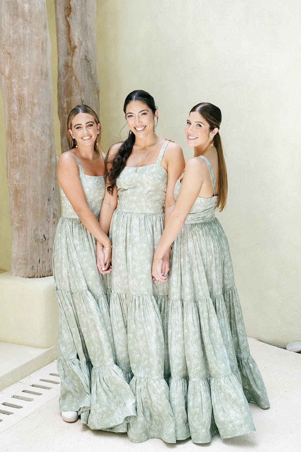Bridesmaids showing off their dresses for the Altos de Chavón wedding.