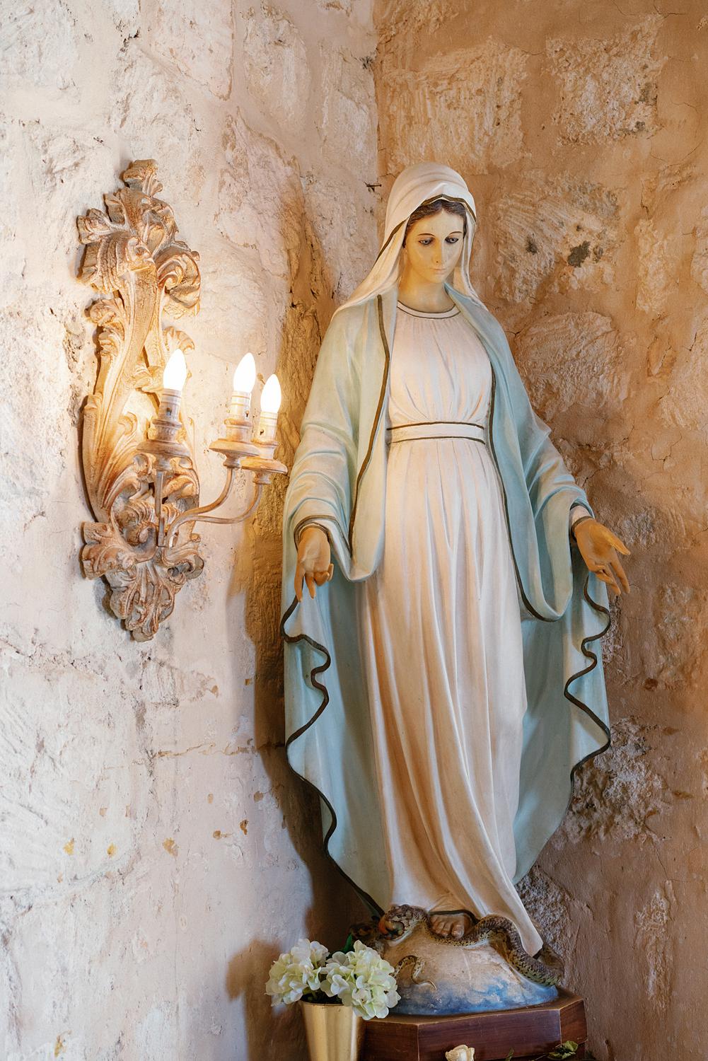 Statue of Mary in stone church at Altos De Chavon