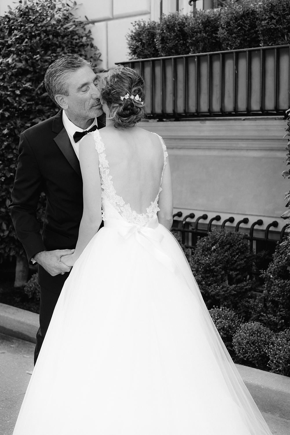 Bride having a first look with her dad before her wedding at DAR Constitution Hall