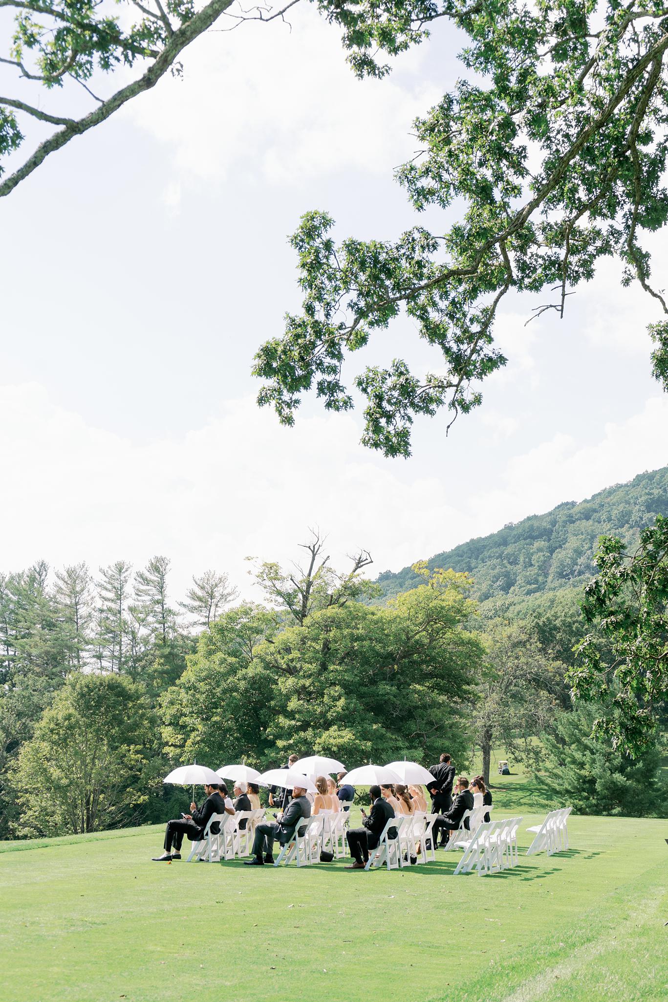 Guests waiting at the ceremony site overlooking The Omni Homestead Resort.