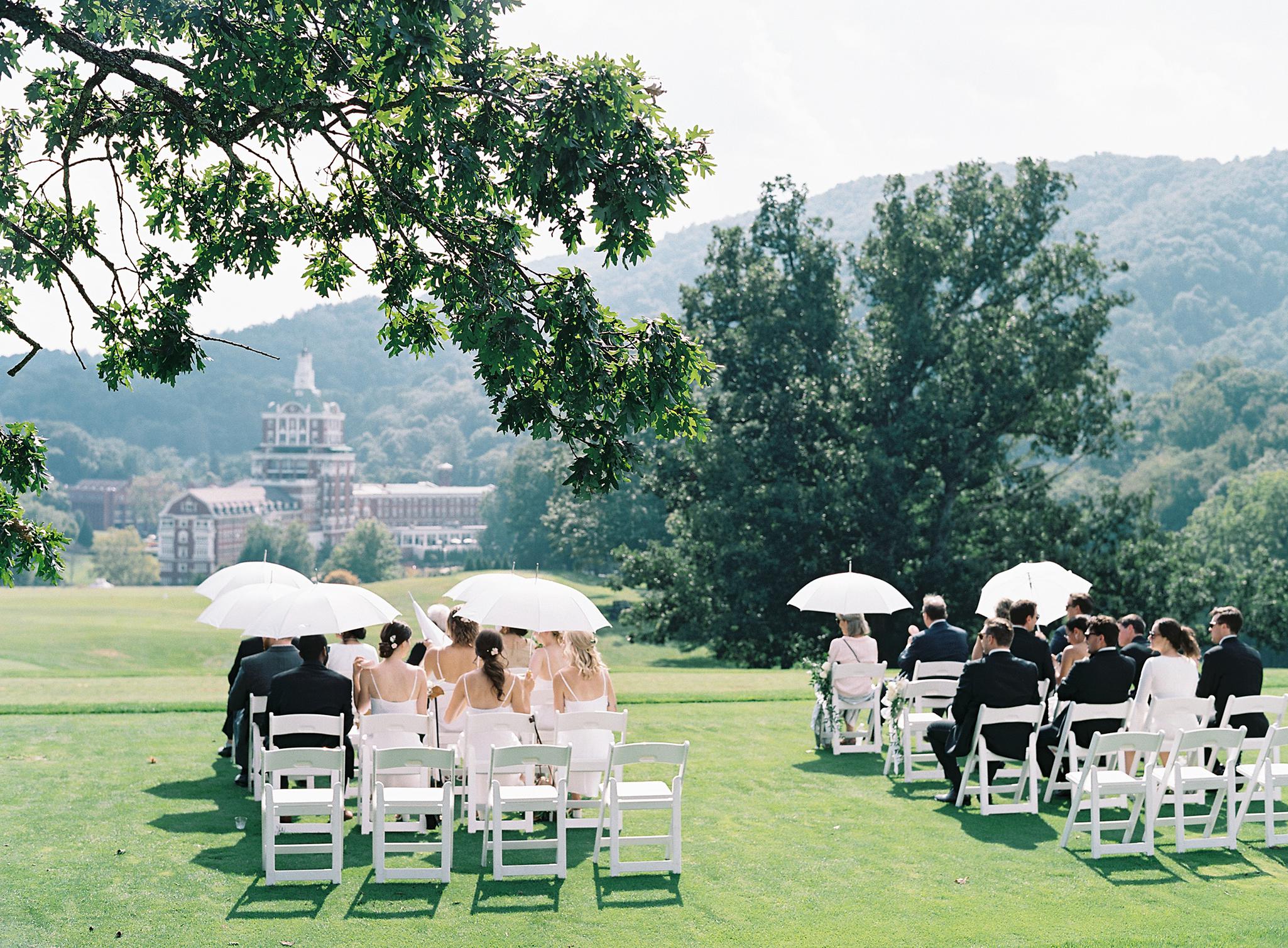 Guests waiting at the ceremony site overlooking The Omni Homestead Resort.