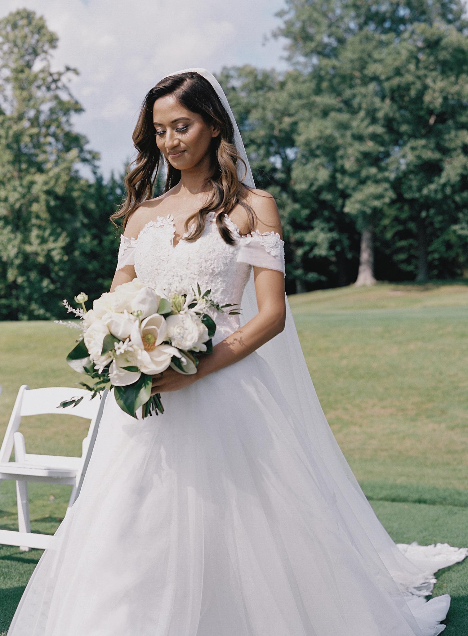 Bride walking down the aisle overlooking The Omni Homestead Resort