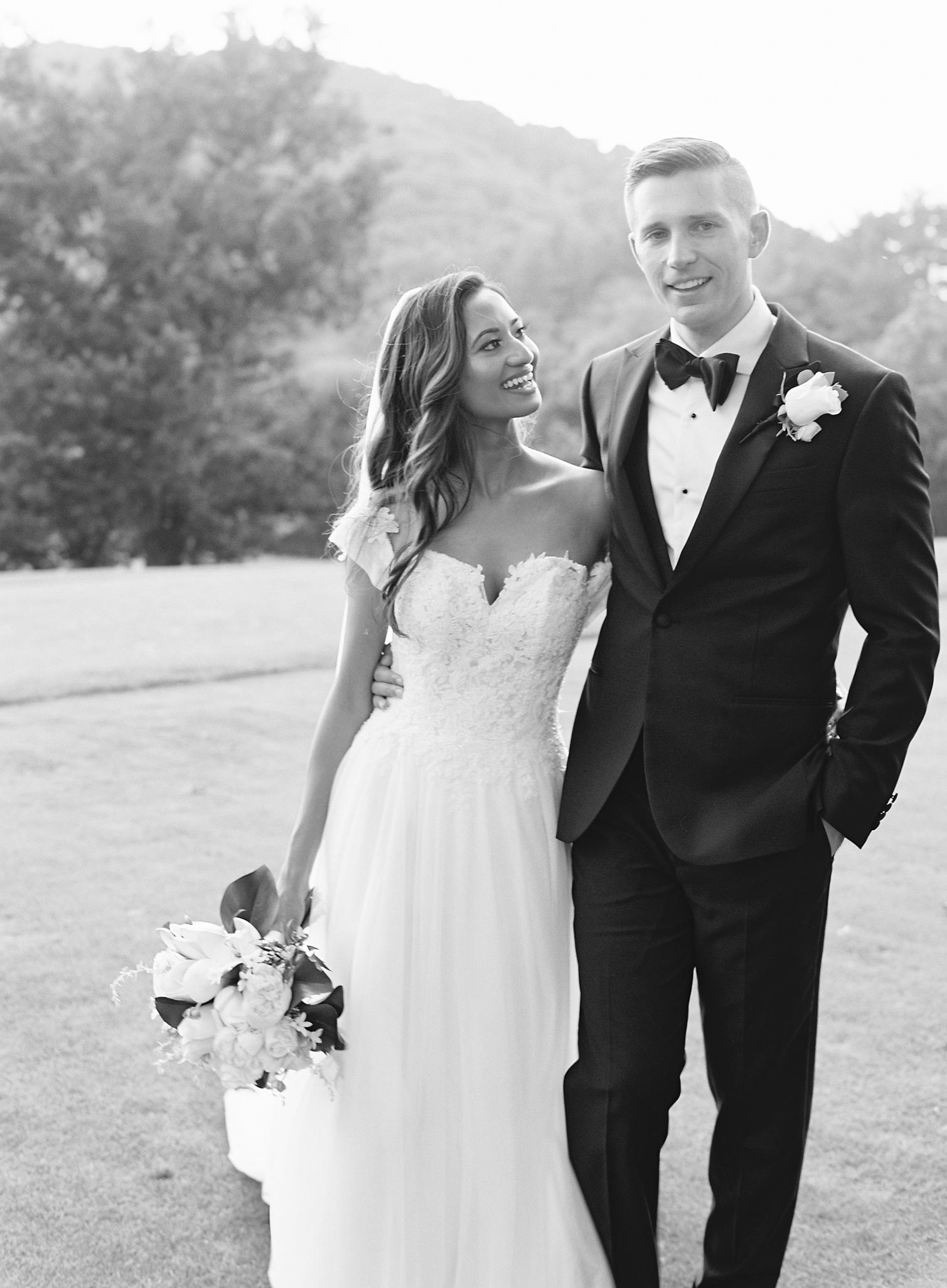 Bride smiling at Groom during their portraits at The Omni Homestead Resort.