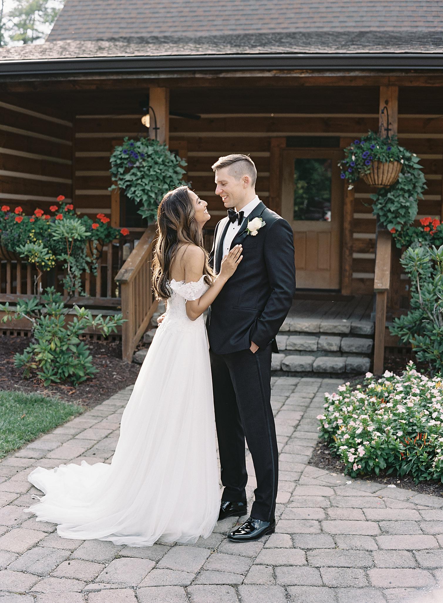 Bride and groom during their portraits just outside of their venue at The Omni Homestead Resort.