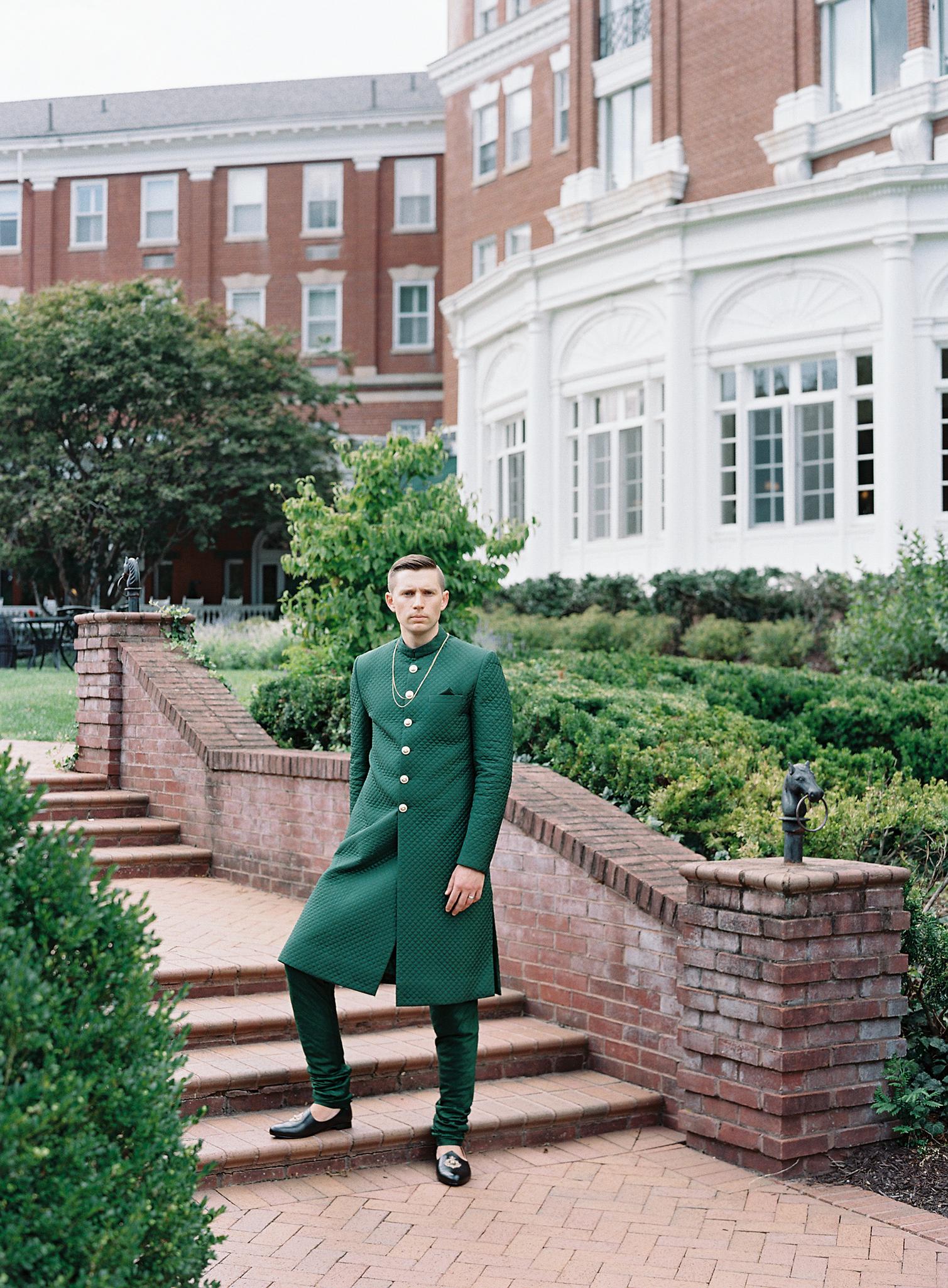 Groom's portrait in his sherwani before their wedding reception at The Omni Homestead Resort.