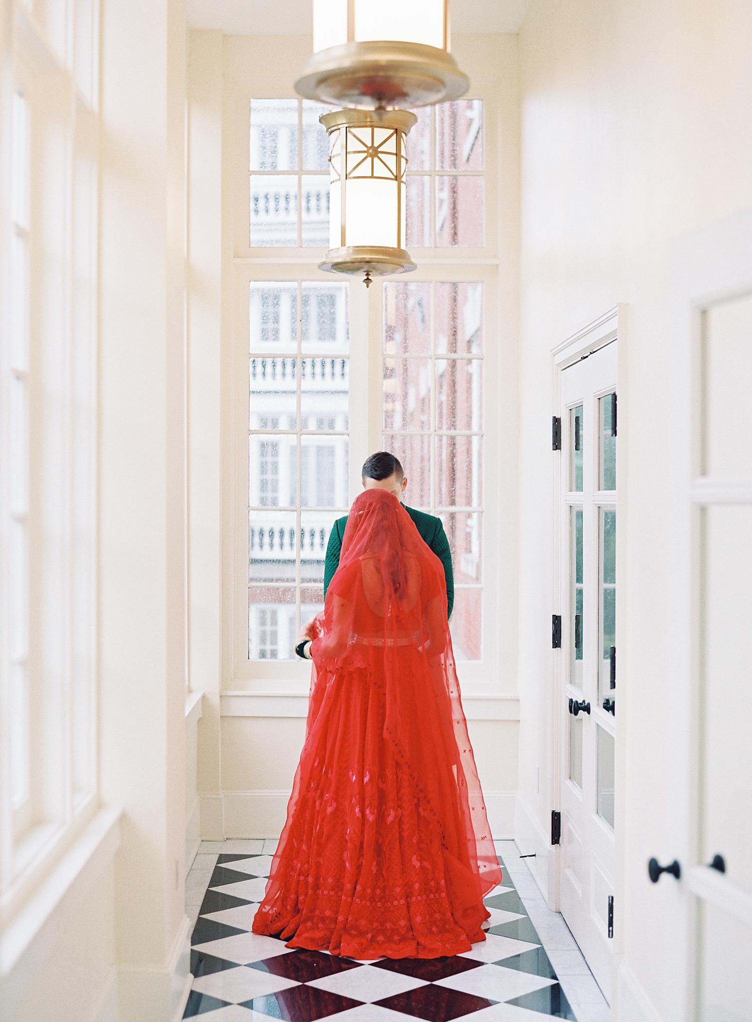 Bride and groom sharing a private moment just before their wedding reception at The Omni Homestead Resort.