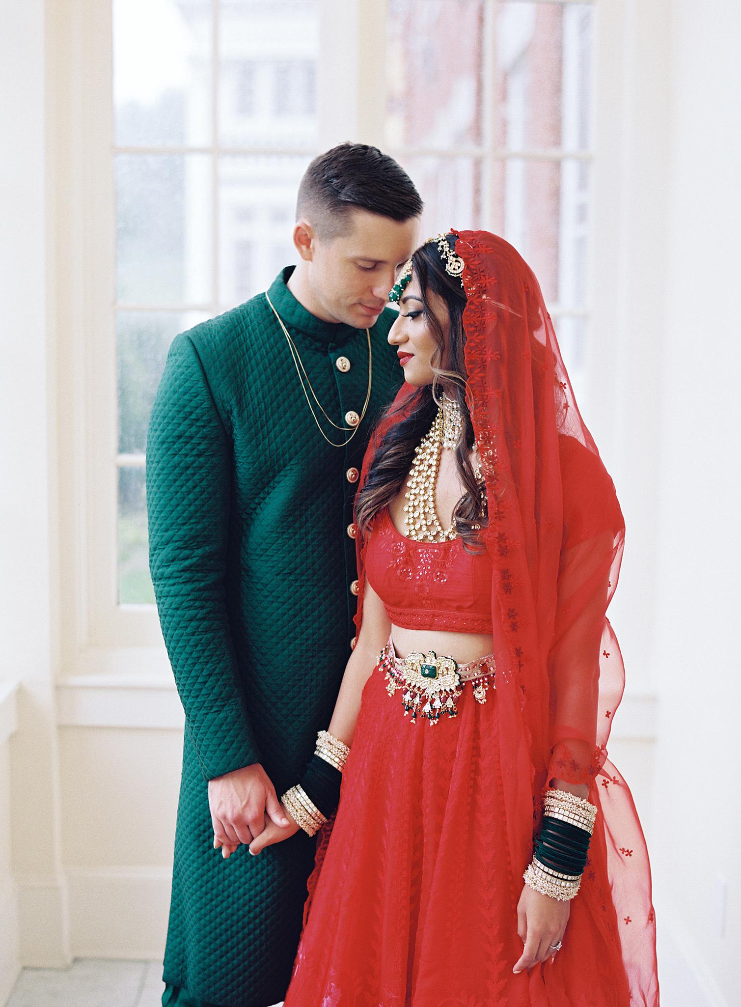 Bride and groom embracing before their Omni Homestead Resort wedding reception.