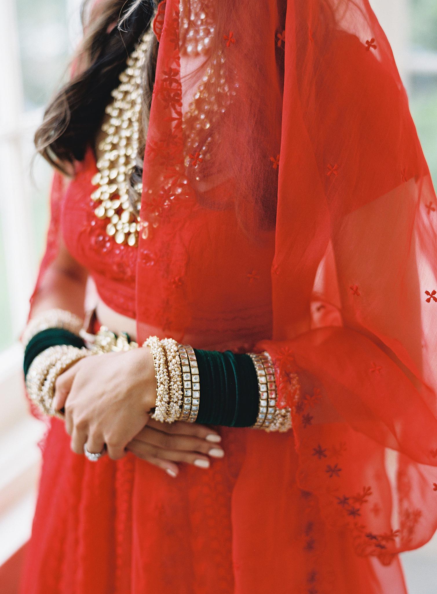 Close up shot of bride's Indian wedding jewelry at her Omni Homestead Resort wedding