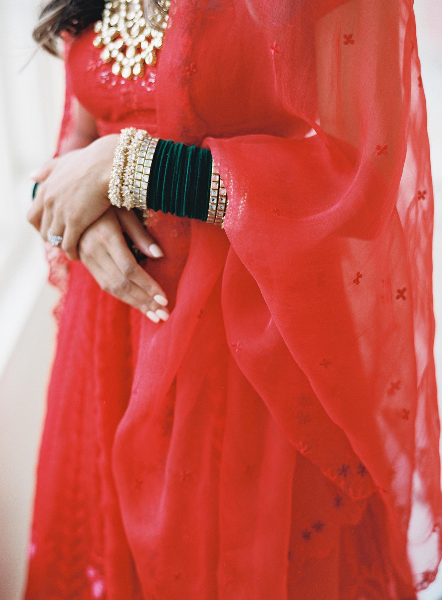 Close up shot of bride's Indian wedding jewelry at her Omni Homestead Resort wedding