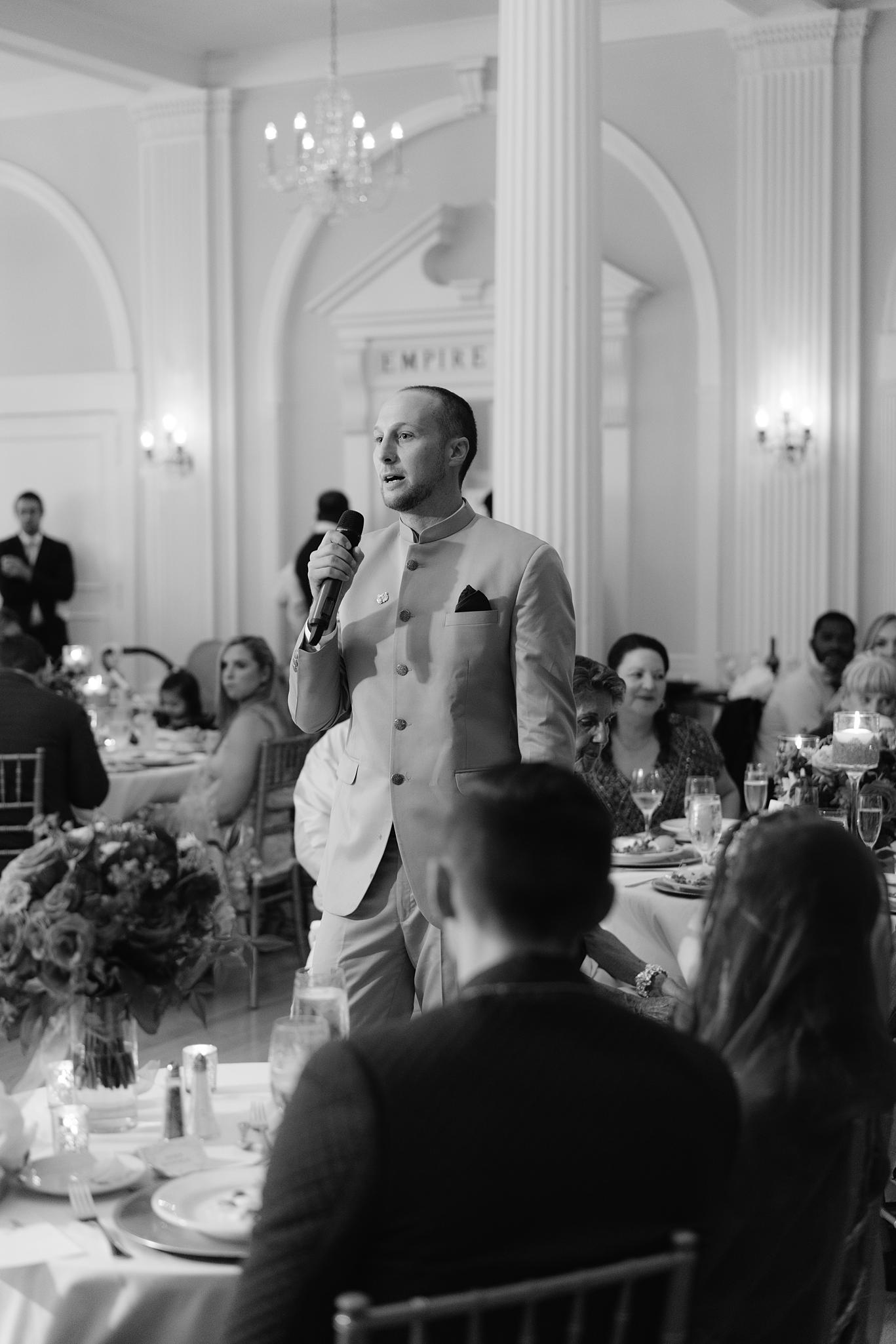 Best man giving his toast to the bride and groom at an Omni Homestead Resort wedding.