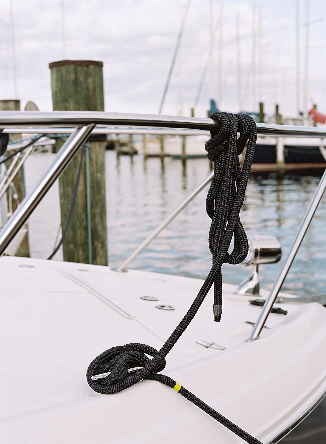 Sailing rope hangin from ship in Annapolis Harbor.