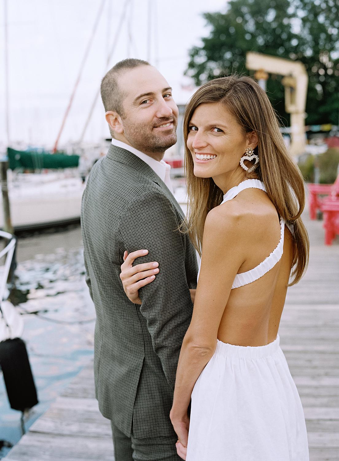 Bride and groom during their rehearsal dinner in The Annapolis Harbor.