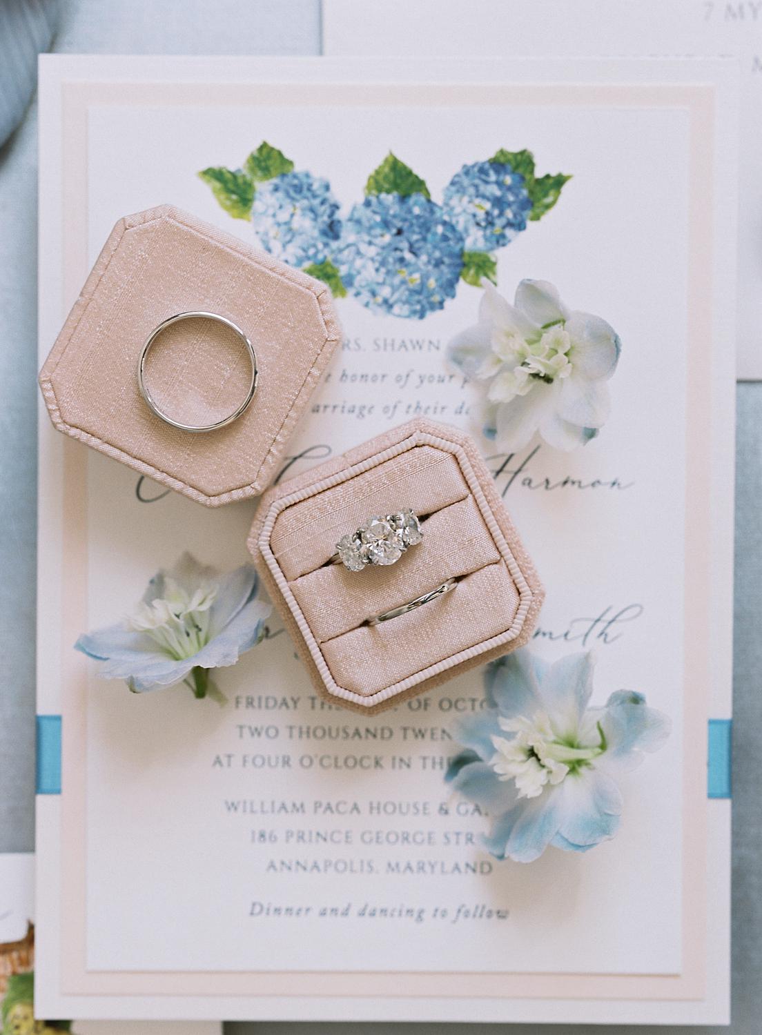 Flatlay of wedding rings while she gets ready for her William Paca House wedding in Annapolis