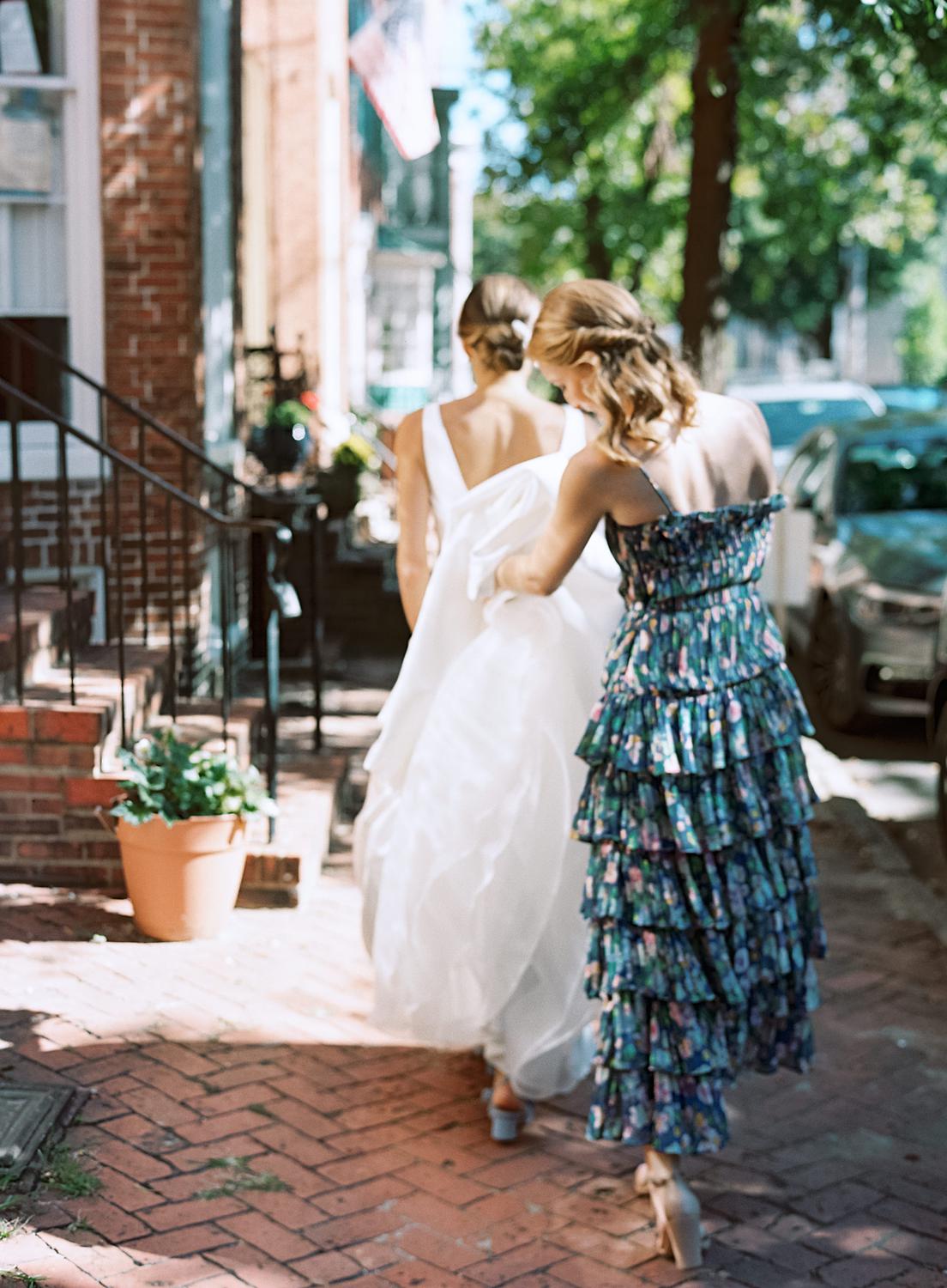 Bride heading out to her first look with her groom just before her William Paca House wedding in Annapolis