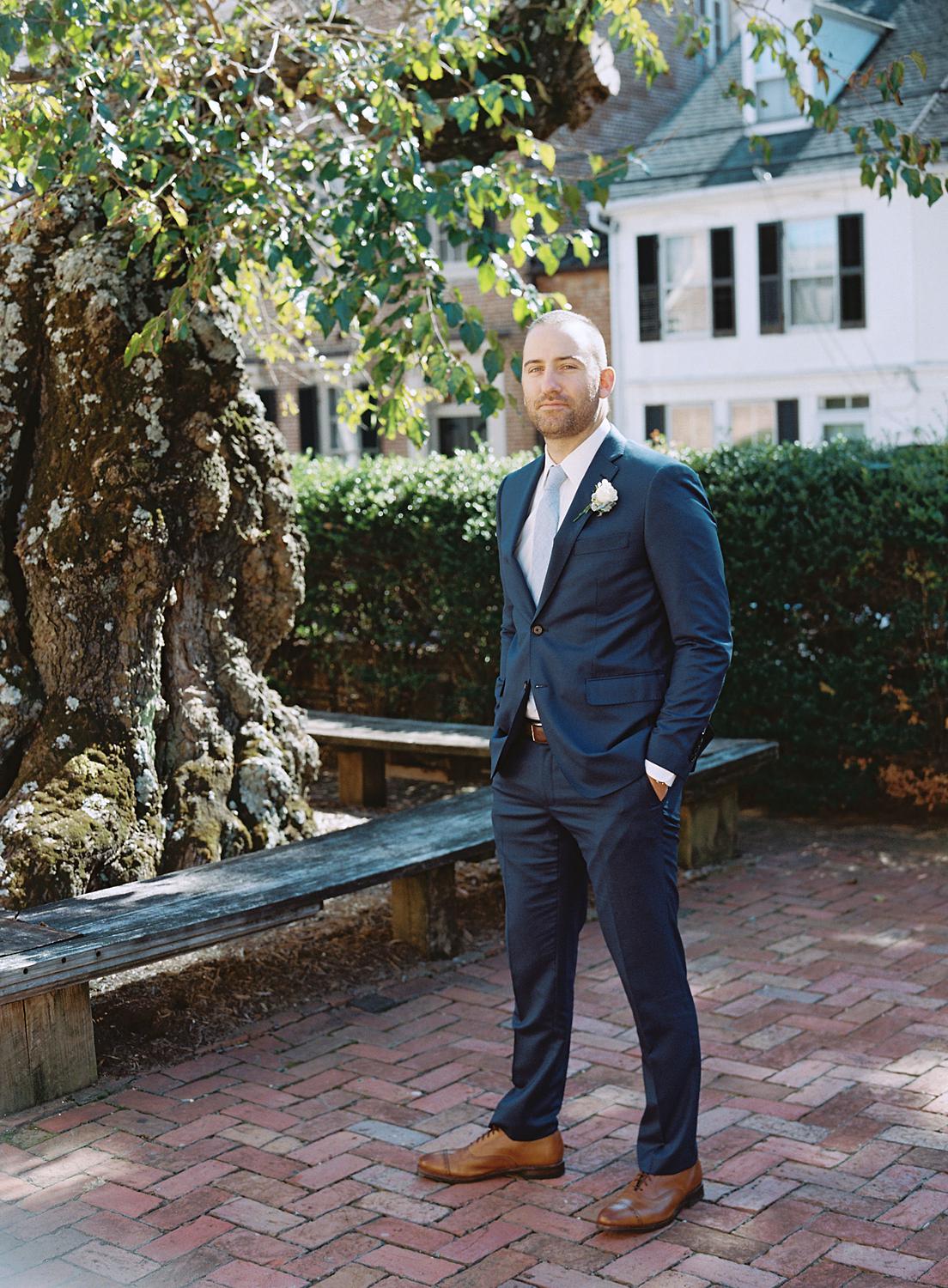 Groom waiting for his first look with his bride at their William Paca House wedding in Annapolis