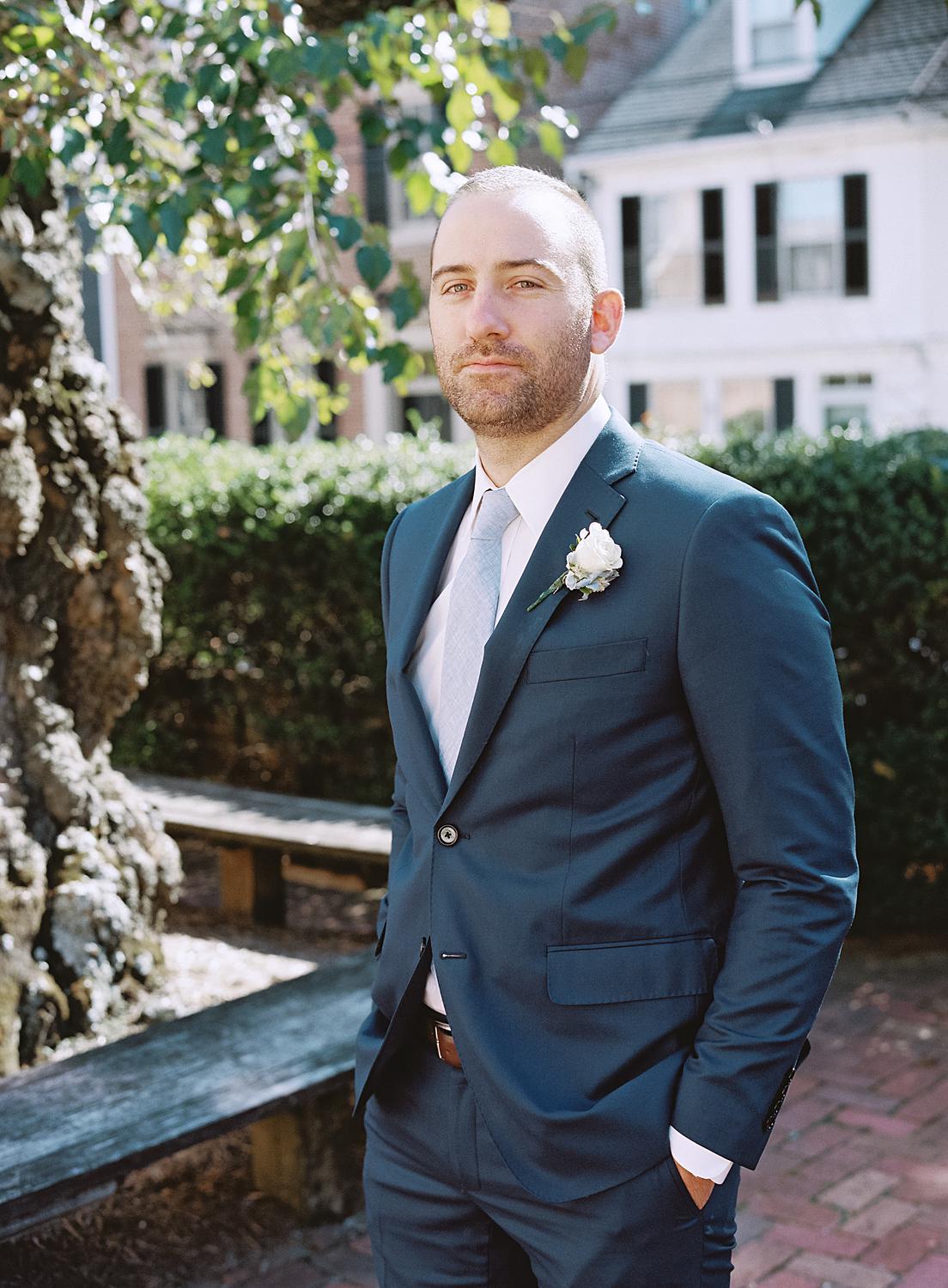 Groom waiting for his first look with his bride at their William Paca House wedding in Annapolis