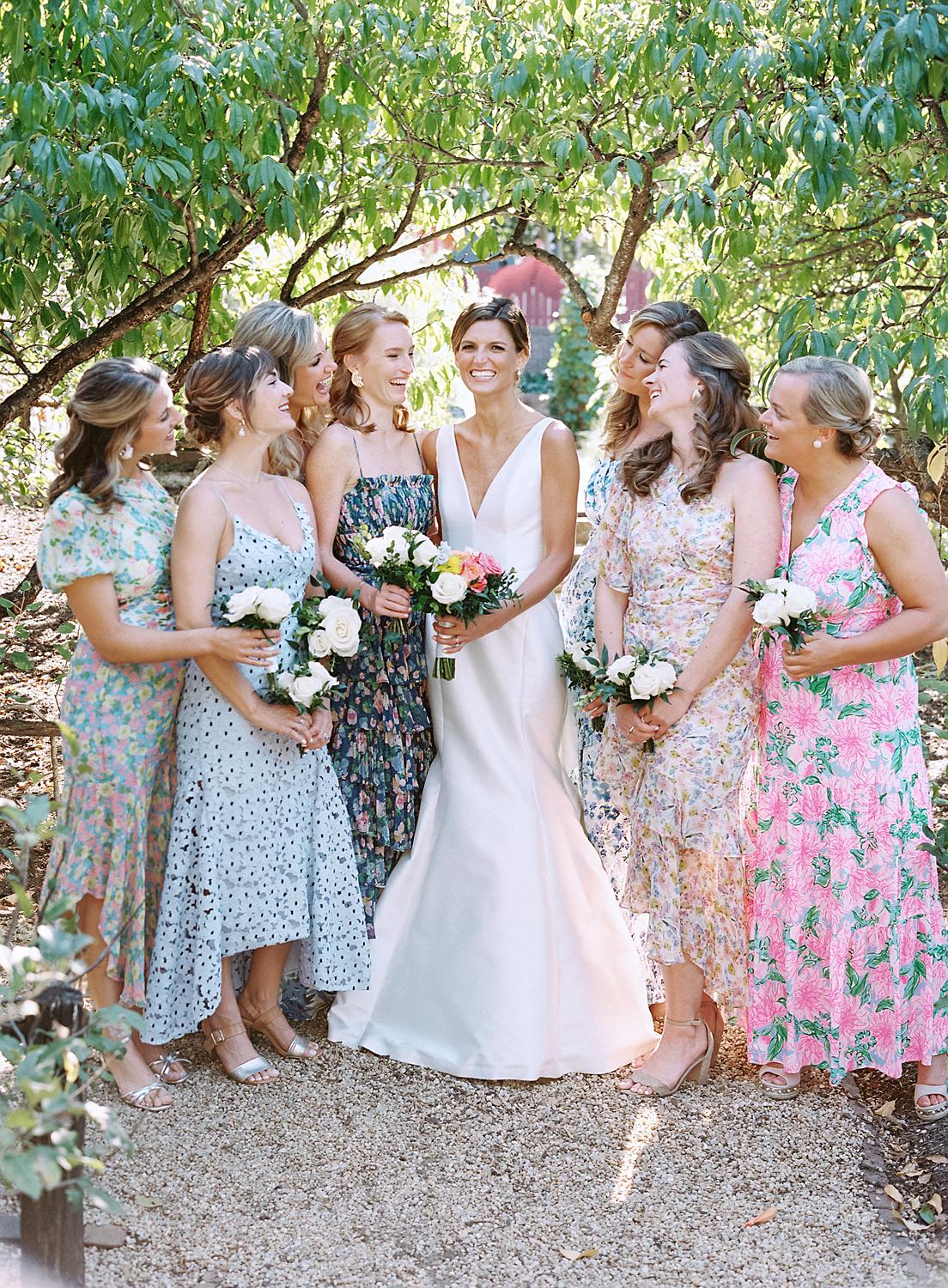 Bride and bridesmaids during portraits at a William Paca House wedding in Annapolis.